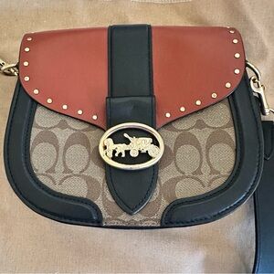 Coach Two-Tone Signature Saddle Crossbody in Rust & Black